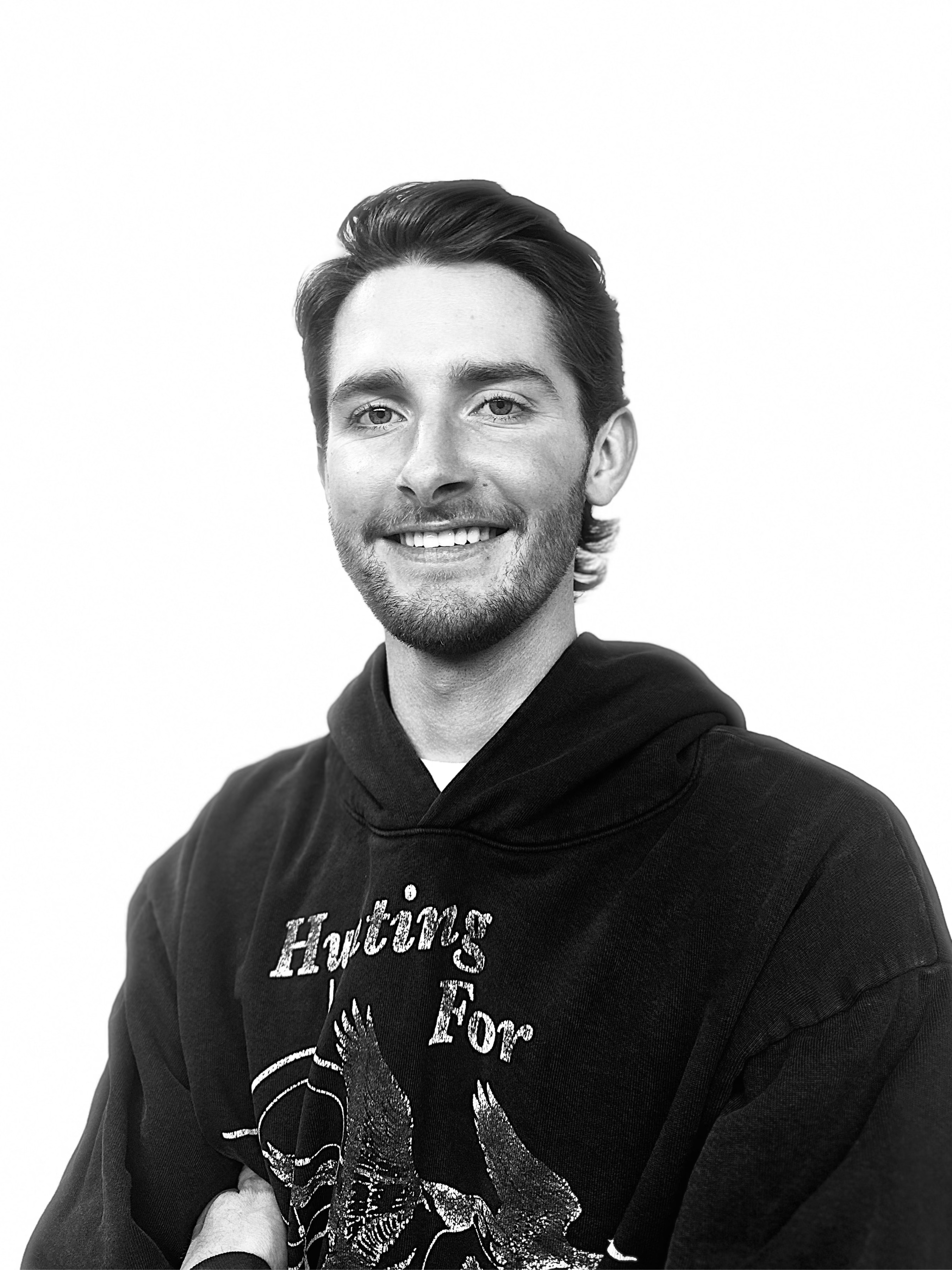 Headshot of Adley Prescot, barber and stylist with The Bureau Barbershop in Salt Lake City.